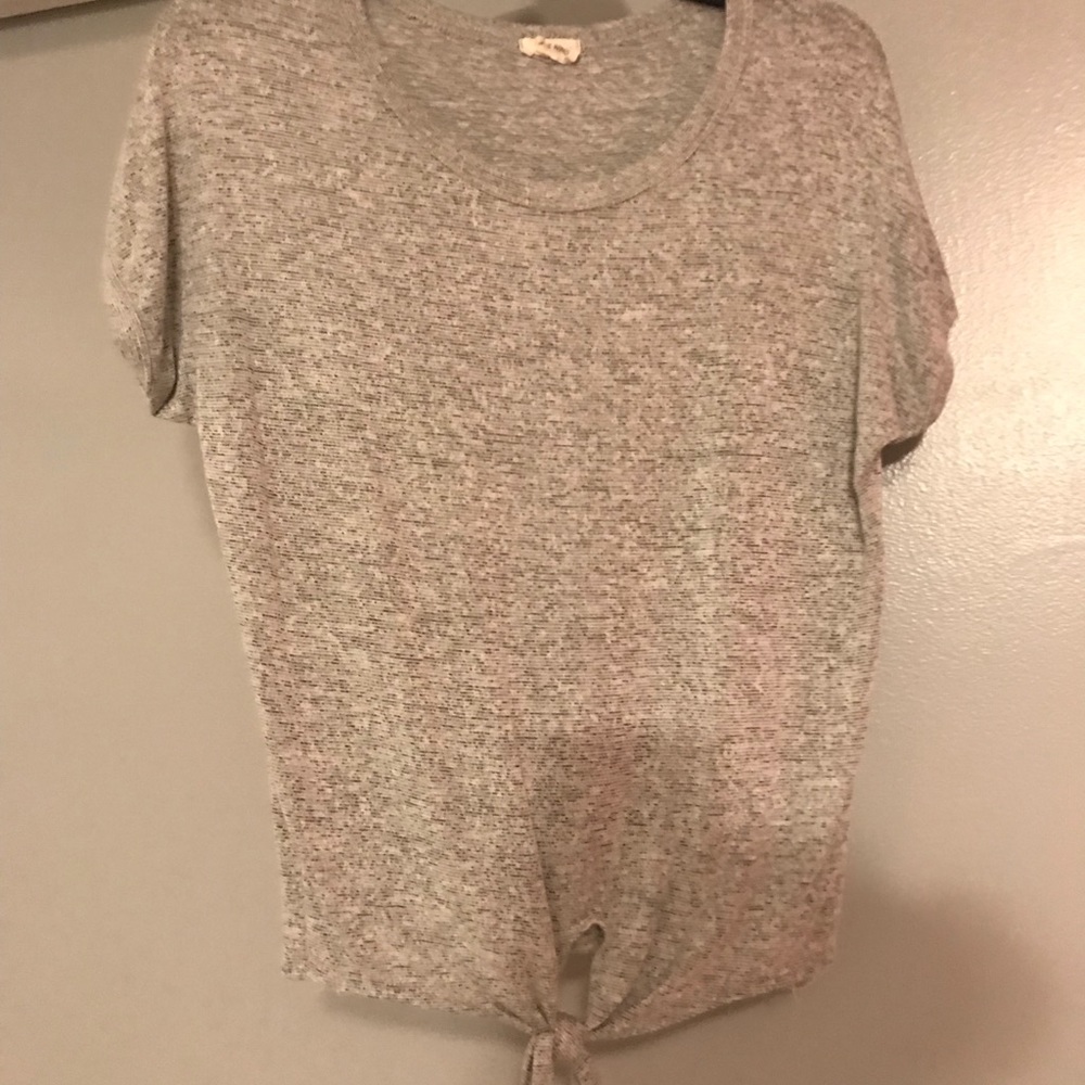 grey marshall’s tie shirt